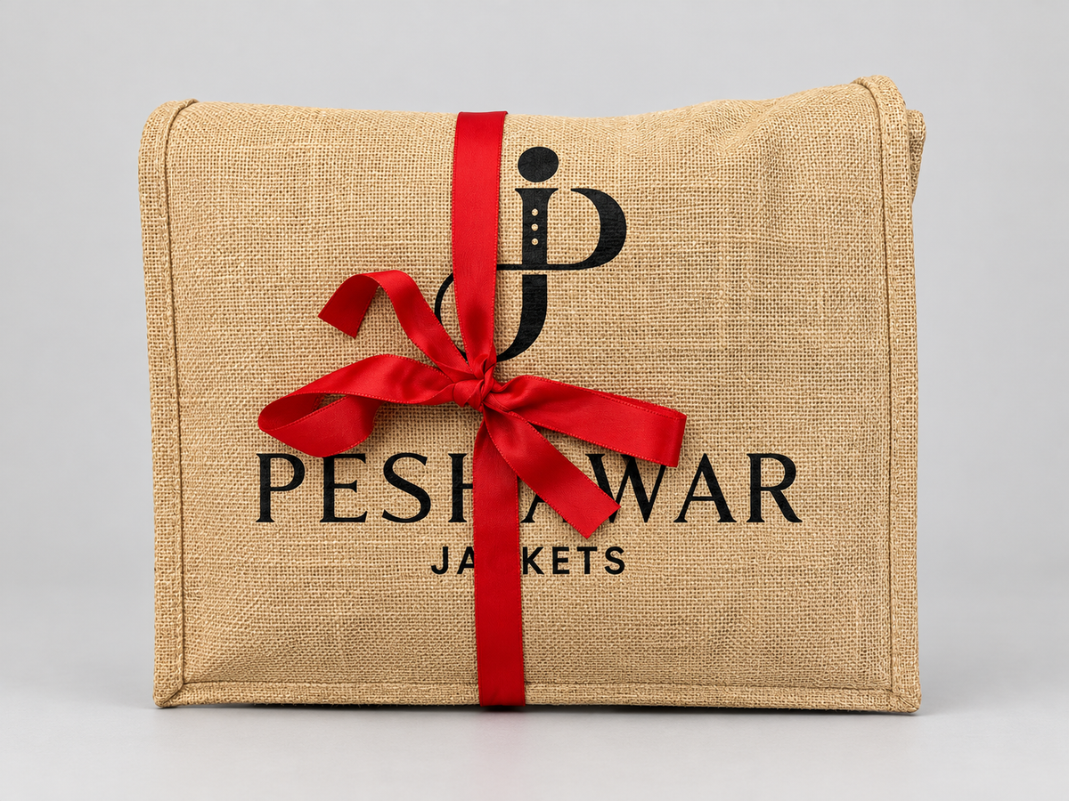 Gift wrapping: hessian bag tied with a red ribbon
